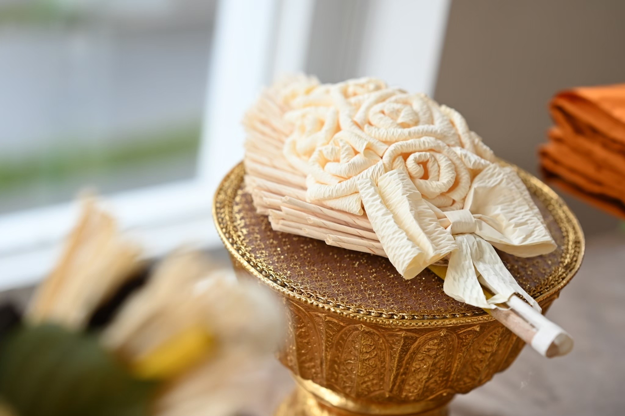 Dok mai chan paper flower offering on gold pedestal