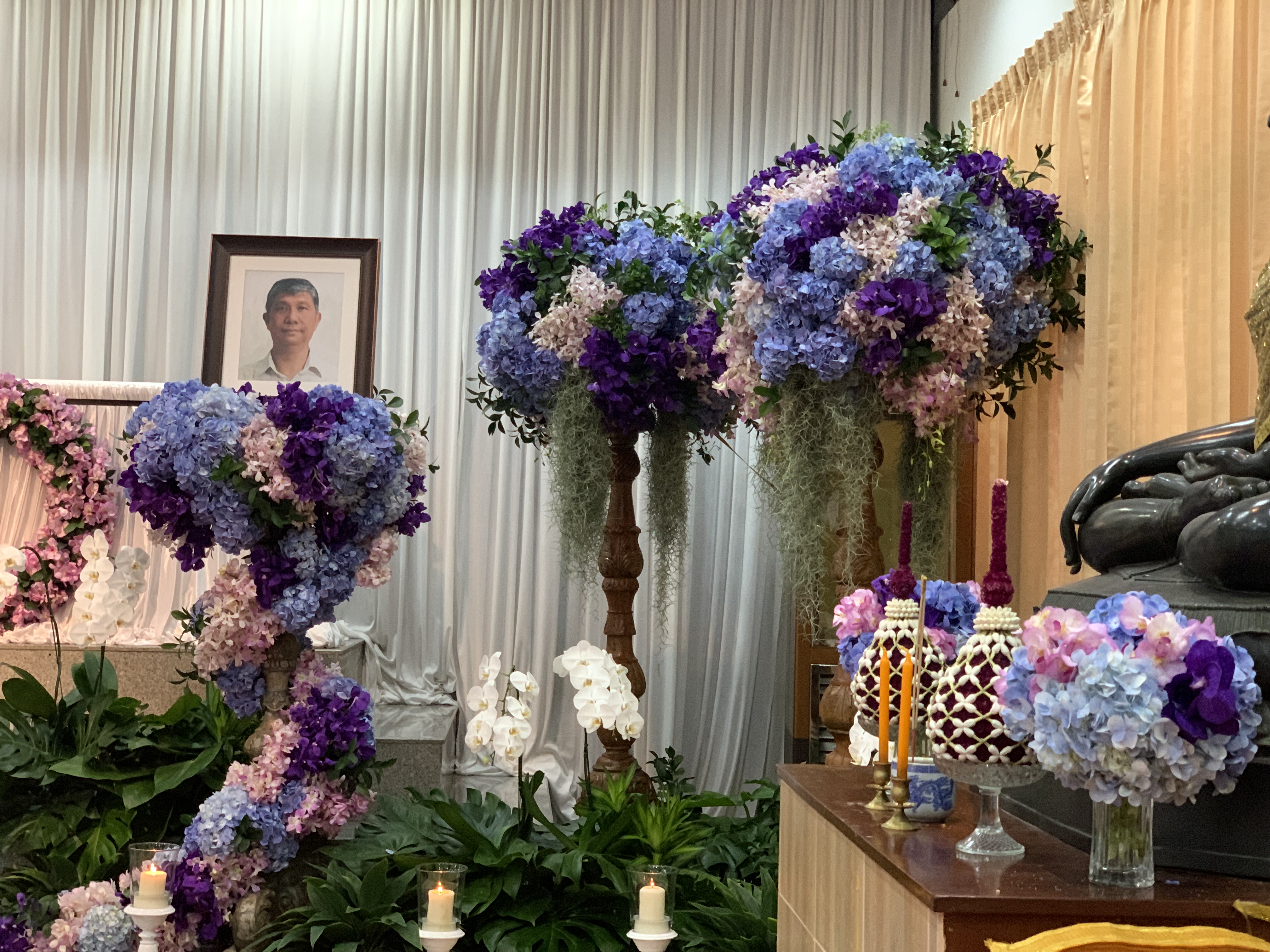Blue and purple hydrangea ceremony setup wide view
